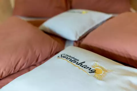 14 Ferienhaus Sonnenhang Apartment Zunig Bett