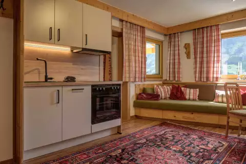 06 Ferienhaus Sonnenhang Apartment Zunig Wohnraum